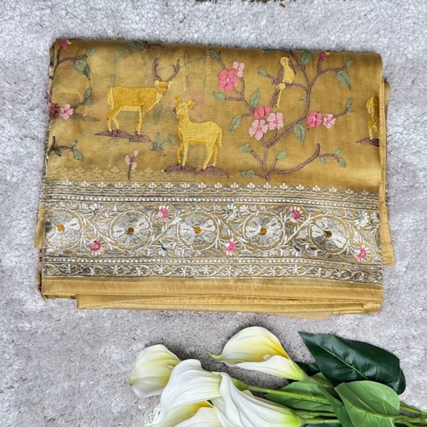 Antique Yellow Deer motifs Tissue Saree with German Silver Border