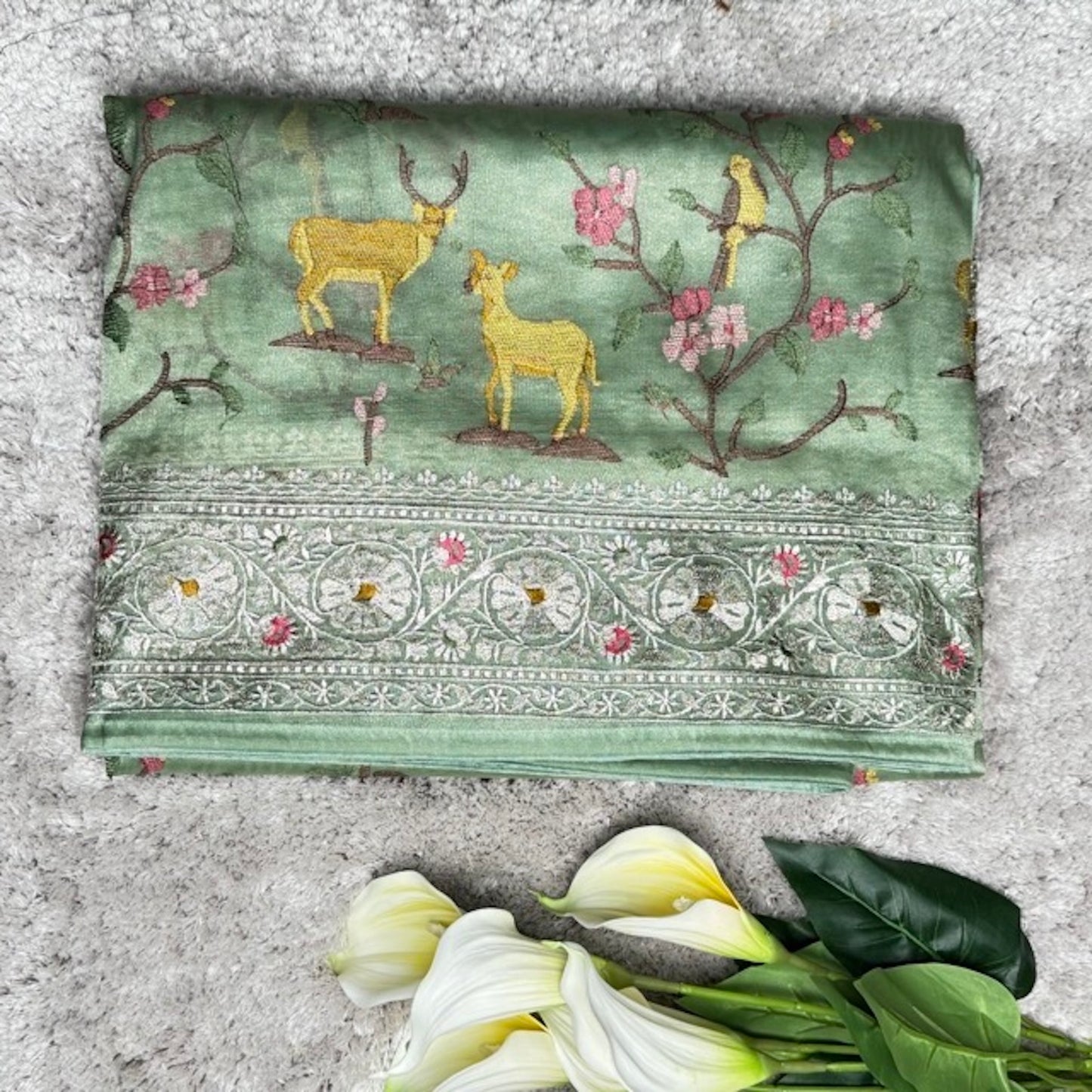 Pastel Mint Deer motifs Tissue Saree with German Silver Border