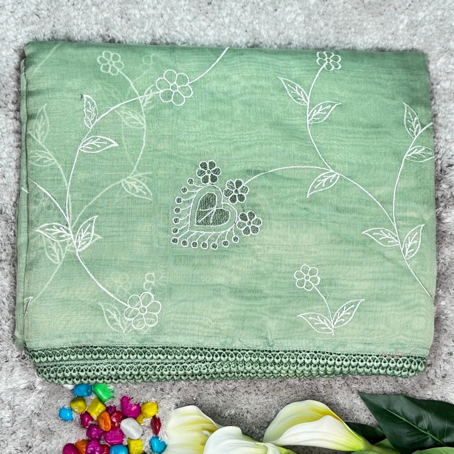 Pastel mint Tissue Embroidered floral motif Saree